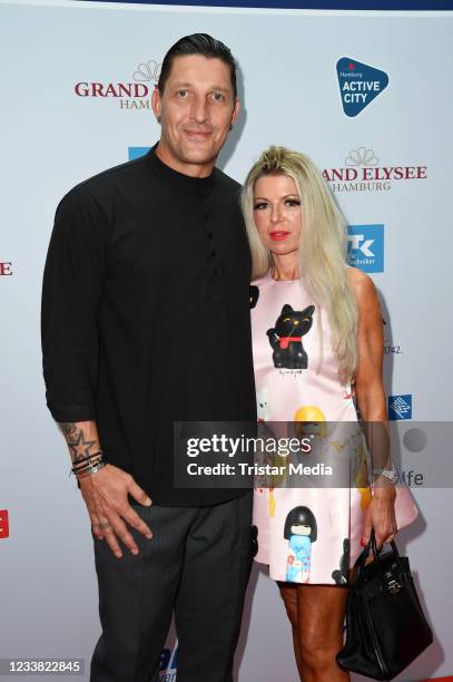 Stefan Kretzschmar and his girlfriend Doreen Dittrich attend the German Sports Journalism Award at Grand Elysee Hotel on July 5, 2021 in Hamburg,...