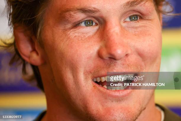 Australia's rugby team captain Michael Hooper speaks during a press conference after a training session at Sanctuary Cove in Gold Coast on July 06...