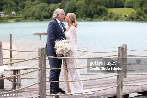 Claudelle Deckert and her husband Peter Olsson during the wedding ceremony of Claudelle Deckert and Peter Olsson on July 5, 2021 at Faehrhuette in...