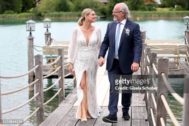 Claudelle Deckert and her husband Peter Olsson during the wedding ceremony of Claudelle Deckert and Peter Olsson on July 5, 2021 at Faehrhuette in...