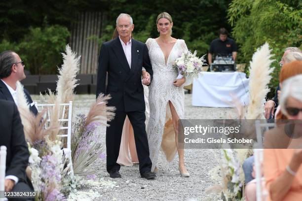 Claudelle Deckert and her father Bernd Deckert during the wedding ceremony of Claudelle Deckert and Peter Olsson on July 5, 2021 at Faehrhuette in...