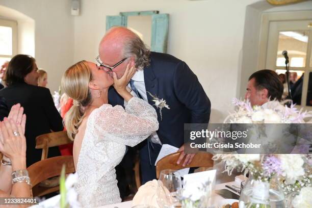 Claudelle Deckert and her husband Peter Olsson during the wedding ceremony of Claudelle Deckert and Peter Olsson on July 5, 2021 at Faehrhuette in...