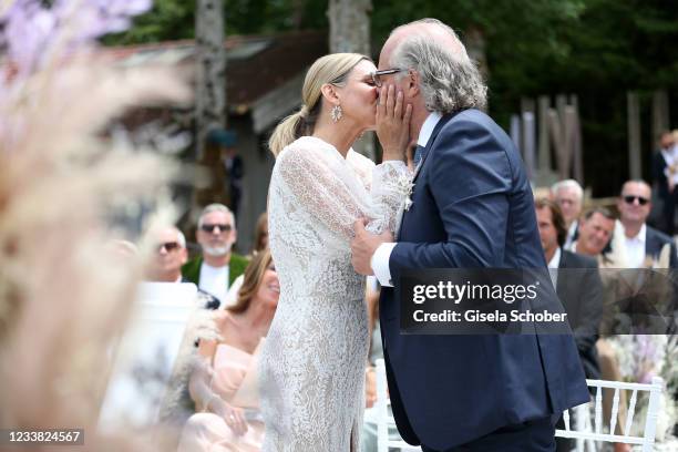 Claudelle Deckert and her husband Peter Olsson during the wedding ceremony of Claudelle Deckert and Peter Olsson on July 5, 2021 at Faehrhuette in...