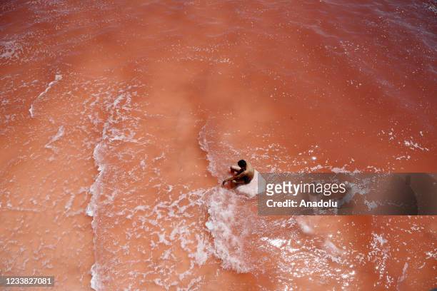 Drone photo shows that people enjoy at the Lake Urmia, one of the biggest saltwater lakes in the world located in the northwest of Iran, as...