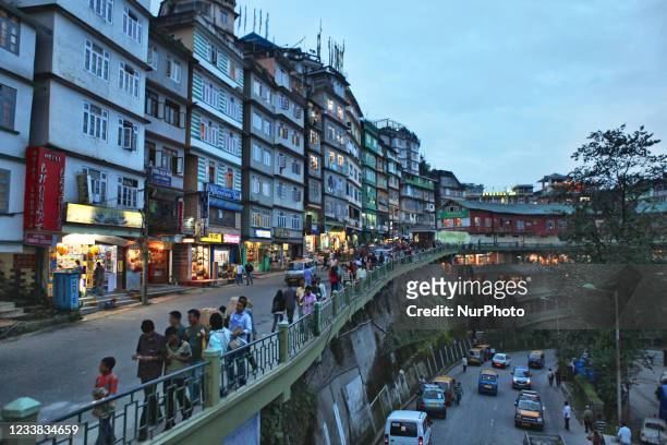 Church Road bustles with both pedestrian and vehicle traffic and is one of the busiest roads in Gangtok, Sikkim, India.