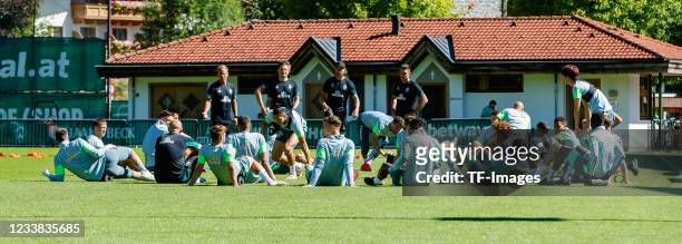 The Werder Bremen players sit on the grass during the SV Werder Bremen - Training Camp at Parkstadion Zell Am Ziller on July 6, 2021 in Zell am...