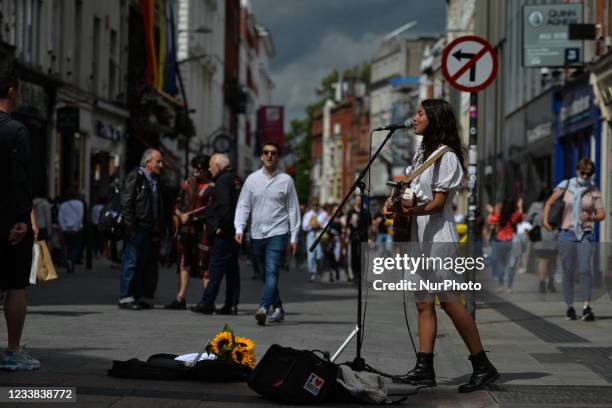 Musician and singer Emmeline Gracie performing on Grafton Street in Dublin. On Monday, 05 July 2021, in Dublin, Ireland