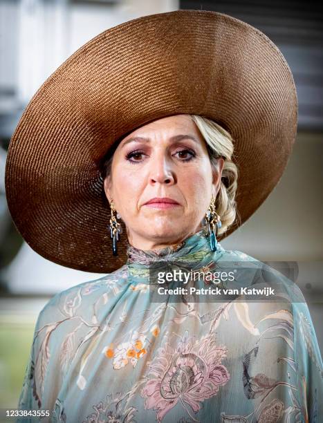 Queen Maxima of the Netherlands looks on as King Willem-Alexander of The Netherlands gives a statement on the shooting attack on Dutch rime reporter...
