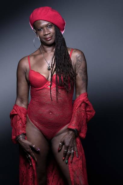 Rose-Aimee Juste retiree, occasional model and Body Positive activist, poses in lingerie during a photo session in Paris on June 28, 2021.