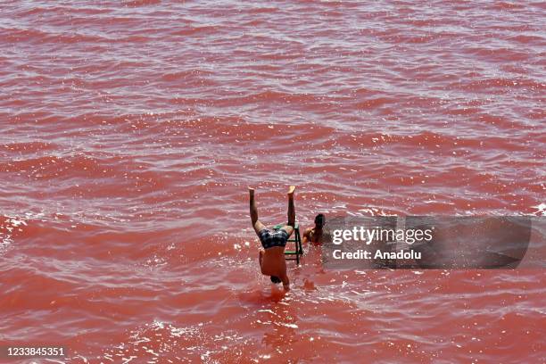 Drone photo shows that people enjoy at the Lake Urmia, one of the biggest saltwater lakes in the world located in the northwest of Iran, as it once...