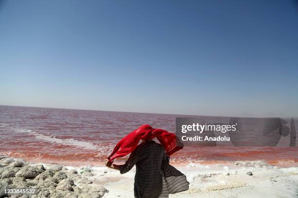 Person is seen near the Lake Urmia, one of the biggest saltwater lakes in the world located in the northwest of Iran, as it once again face a threat...