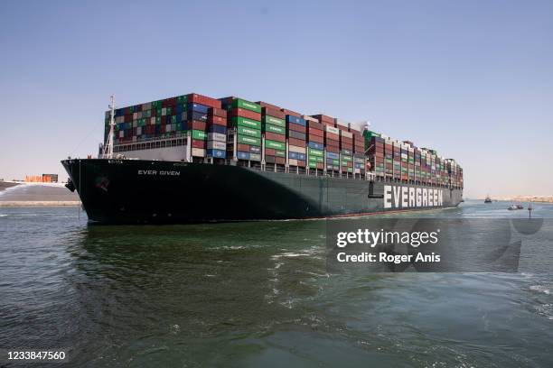 Evergreen ship leaves Suez Canal to the Mediterranean after the signing of the settlement contract, on July 7, 2021 in Ismailia, Egypt. The ship had...