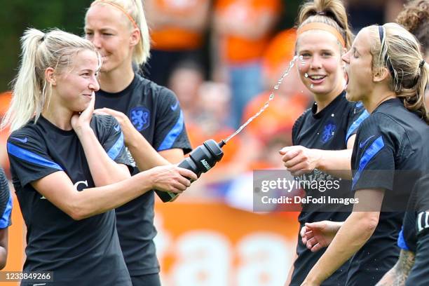 Jackie Groenen of Netherlands and Katja Snoeijs of Netherlands play with water during the training session of Netherlands Women at Mac3Park Stadium...