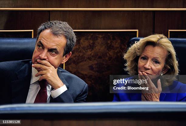 Jose Luis Rodriguez Zapatero, Spain's prime minister, left, and Elena Salgado, Spain's finance minister, listen to a debate on constitutional rule...