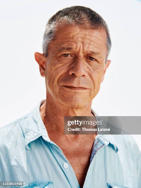 Writer and filmmaker Emmanuel Carrère poses for a portrait on July 6, 2021 in Cannes, France.