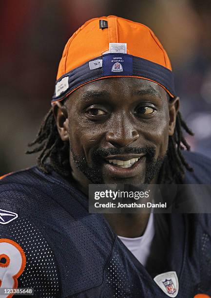 Charles Tillman of the Chicago Bears smiles while sitting on the bench during a preseason game against the Cleveland Browns at Soldier Field on...