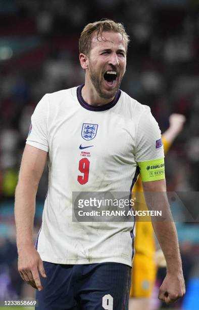 England's forward Harry Kane celebrates after winning the UEFA EURO 2020 semi-final football match between England and Denmark at Wembley Stadium in...