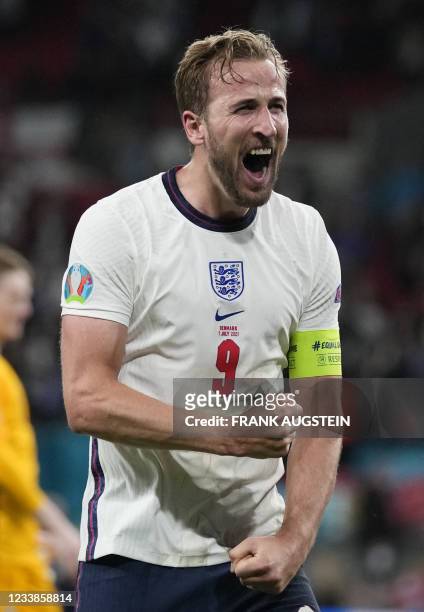 England's forward Harry Kane celebrates after winning the UEFA EURO 2020 semi-final football match between England and Denmark at Wembley Stadium in...