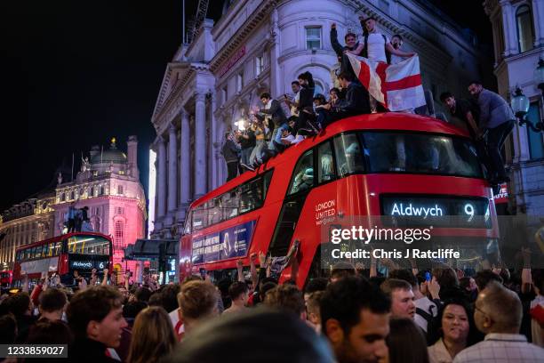 England football fans celebrate in the streets surrounding Piccadilly and Leicester Square after England beat Denmark in their semi final game on...