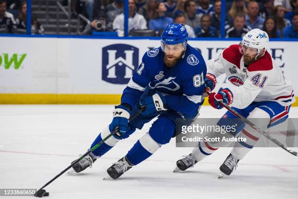 Erik Cernak of the Tampa Bay Lightning skates against Paul Byron of the Montreal Canadiens during the second period of Game Five of the Stanley Cup...