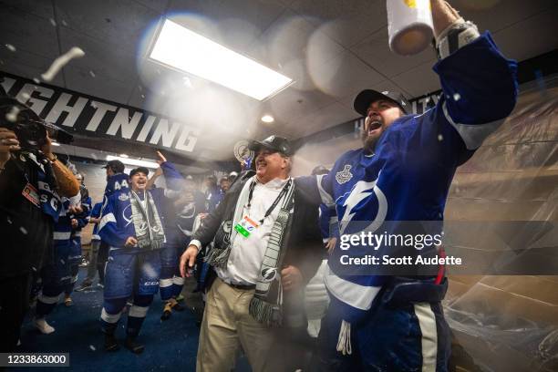 Jeff Vinik and Nikita Kucherov of the Tampa Bay Lightning celebrates in the locker room with the Stanley Cup after the Tampa Bay Lightning defeated...