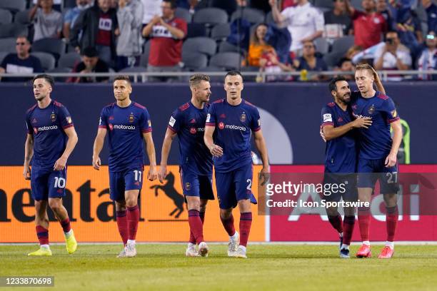 Chicago Fire forward Robert Beric celebrates with teammates after scoring a goal in action during a game between the Chicago Fire and the Orlando...