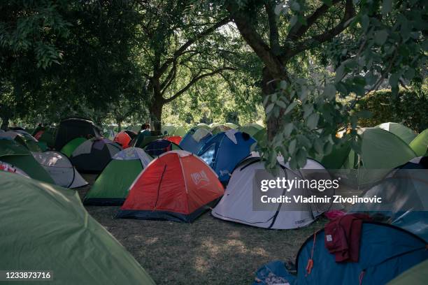 People rest in the camp before the Exit festival starts on July 8, 2021 in Novi Sad, Serbia. With a significant decrease in Covid-19 infections,...