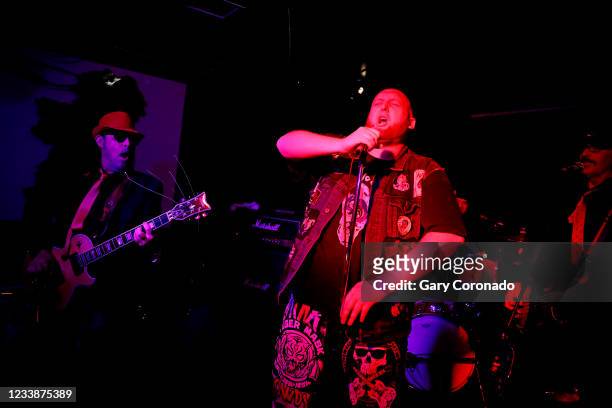 Rob Simundson, of Torrance, sings Bloodstains by Agent Orange at Punk Rock Karaoke at Gallagher's Pub HB on Saturday, June 12, 2021 in Huntington...