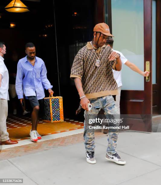 Travis Scott is seen in walking out of a hotel in SoHo on July 8, 2021 in New York City.