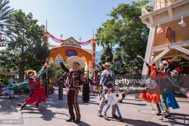 In this handout photo provided by Disneyland Resorts, Plaza de la Familia at Disney California Adventure Park celebrates the spirit of Día de los...