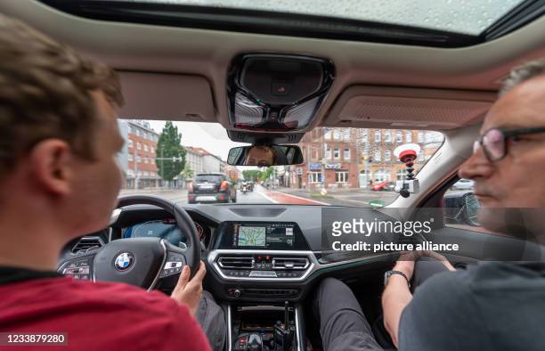 July 2021, Lower Saxony, Hanover: Hendrik Vorreiter and Dirk Hallmann of the Hanover Police Department drive stiffs in the city centre. Police...