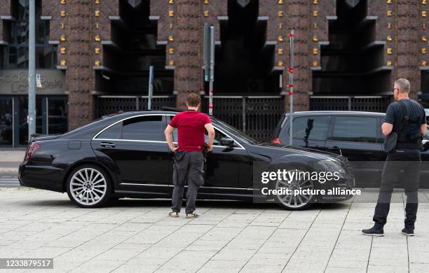 July 2021, Lower Saxony, Hanover: Hendrik Vorreiter of the Hanover police carries out a vehicle check in the city centre. Police officers in Hanover...