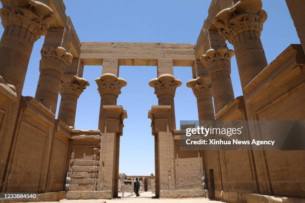 July 8, 2021 Xinhua -- Photo taken on June 26, 2021 shows a view of the Philae temples on Agilkia Island in Aswan, Egypt. On a brief boat voyage in...