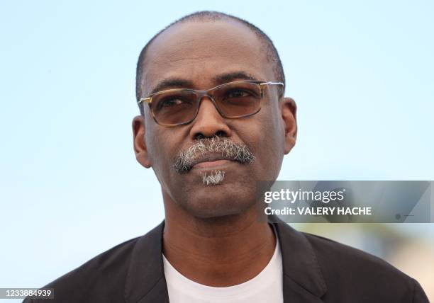 Chadian director Mahamat-Saleh Haroun poses during a photocall for the film "Lingui" at the 74th edition of the Cannes Film Festival in Cannes,...