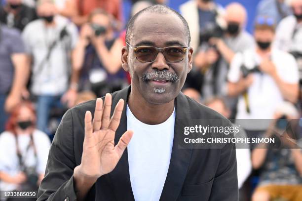 Chadian director Mahamat-Saleh Haroun poses during a photocall for the film "Lingui" at the 74th edition of the Cannes Film Festival in Cannes,...