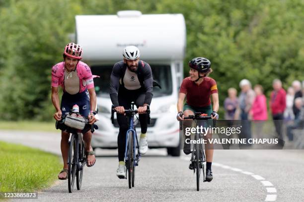 Australian cyclist Lachlan Morton and amateur supporting cyclists ride during the 13th day of his solo alternative Tour de France cycling race near...