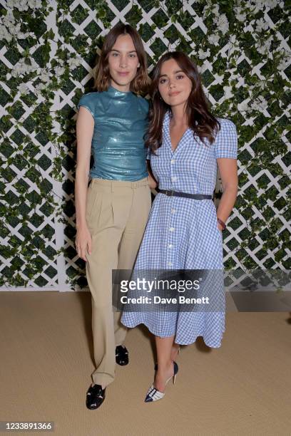 Alexa Chung and Jenna Coleman attend the Polo Ralph Lauren VIP suite during Wimbledon at All England Lawn Tennis and Croquet Club on July 9, 2021 in...