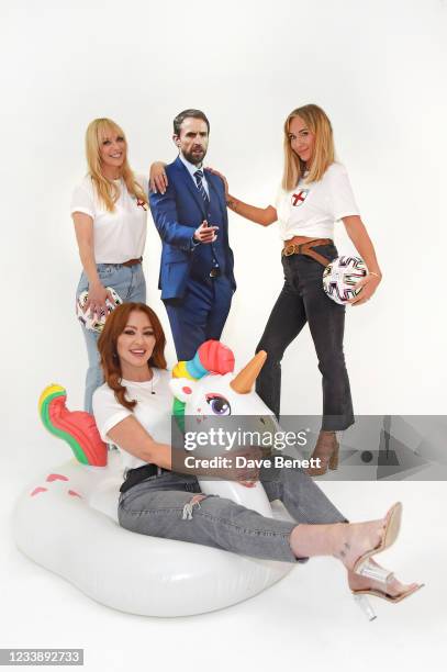 Liz McClarnon, Natasha Hamilton and Jenny Frost of Atomic Kitten pose with a cardboard cutout of England manager Gareth Southgate to celebrate...