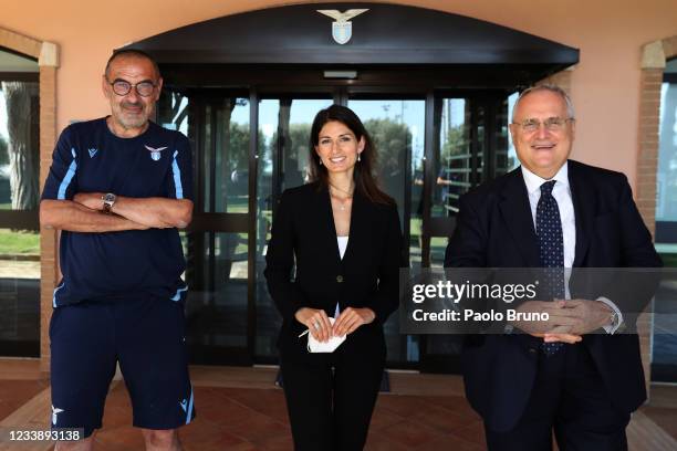 Lazio new head coach Maurizio Sarri, Rome's Mayor Virginia Raggi and SS Lazio President Claudio Lotito pose after the press conference at Formello...