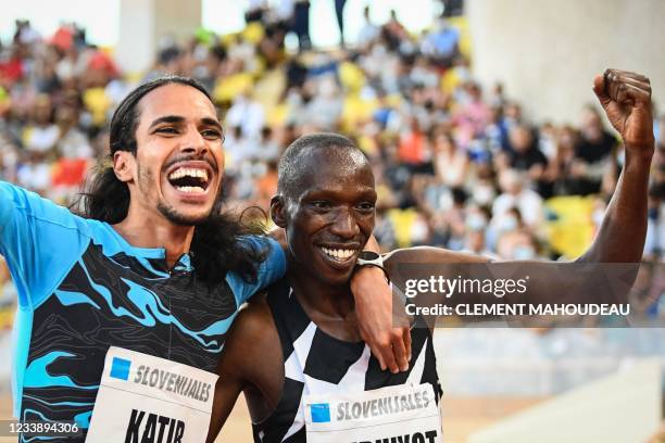 Second-placed Spain's Mohamed Katir and first-placed Kenya's Timothy Cheruiyot celebrate after competing in the Men's 1500m during the IAAF Diamond...