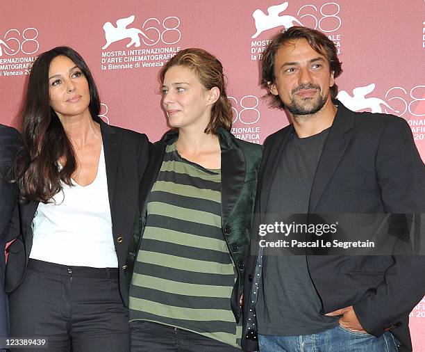 Monica Bellucci, Celine Sallette, Jerome Robart pose at the "Un Ete Brulant" photocall at the Palazzo del Cinema during the 68th Venice Film Festival...