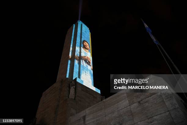 View of the Flag's monument with an image of Argentine football star Lionel Messi's image projected on it, as part of a video mapping in support of...