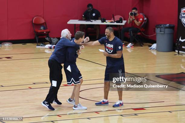 Coaches, Gregg Popovich, Will Hardy and Ime Udoka of the USA Men's National Team have some fun during practice for training camp on July 9, 2021 at...