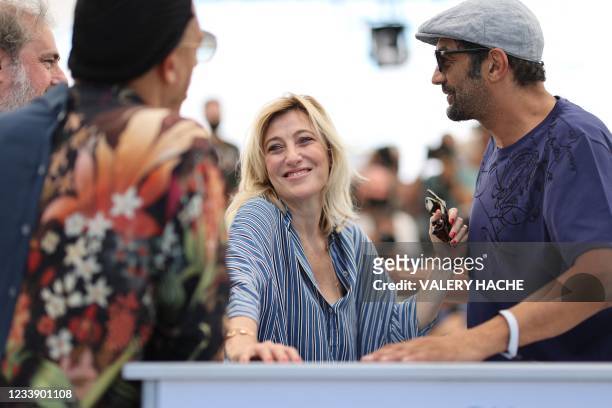 French-Italian actress Valeria Bruni Tedeschi poses with French actor and director Gustave Kervern , French rapper and actor JoeyStarr and French...