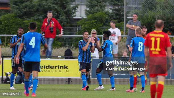 Dusan Tadic of Ajax and Mohammed Kudus of Ajax speaks with during the Pre-Season Friendly match between Ajax Amsterdam and SC Paderborn 07 at...