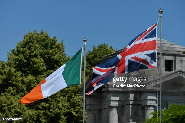 Irish and Union Jack flags seen during a wreath laying ceremony marking the 105th anniversary of the Battle of the Somme, in the Irish National War...