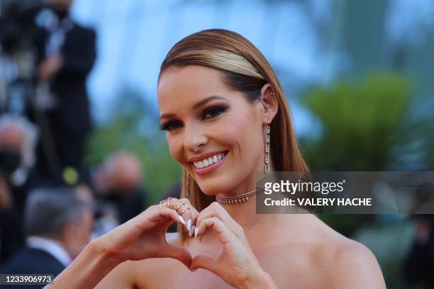 Miss France 2018 Maeva Coucke poses as she arrives for the screening of the film "De Son Vivant" at the 74th edition of the Cannes Film Festival in...