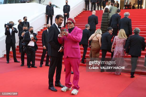 French actor Ramzy Bedia and French rapper and actor JoeyStarr arrive for the screening of the film "De Son Vivant" at the 74th edition of the Cannes...