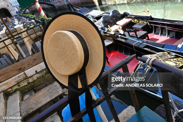 This picture taken in Venice on July 10, 2021 shows a hat of gondolier.