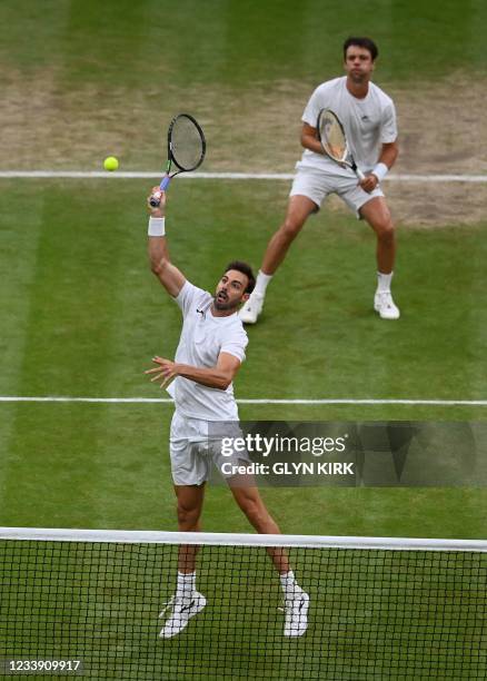 Spain's Marcel Granollers and Argentina's Horacio Zeballos play against Croatia's Nikola Mektic and Mate Pavic during their men's doubles final match...